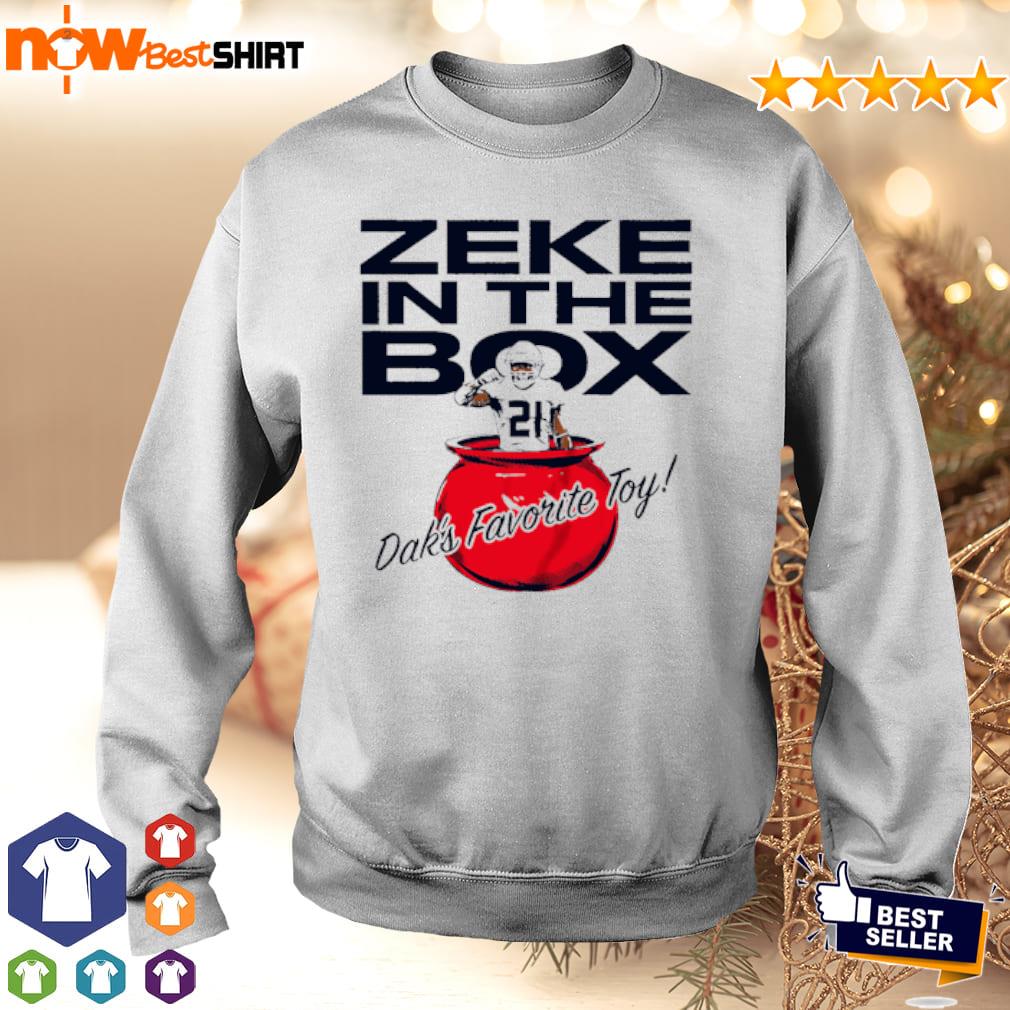 Ezekiel Elliott in the box Dak's favorite toy shirt