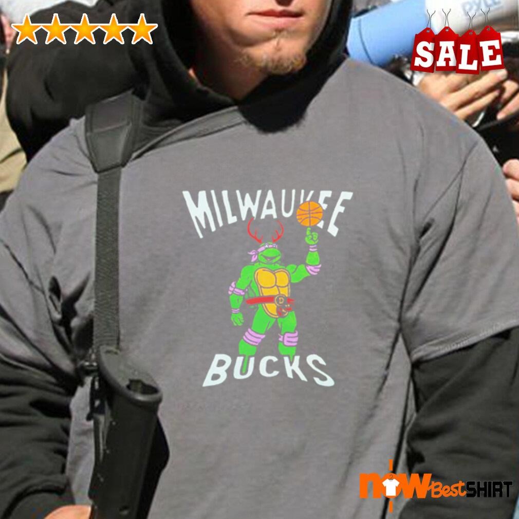 https://images.nowbestshirt.com/2023/12/Ninja-Turtle-Donatello-x-Milwaukee-Bucks-shirt-long-sleeve-tee.jpg