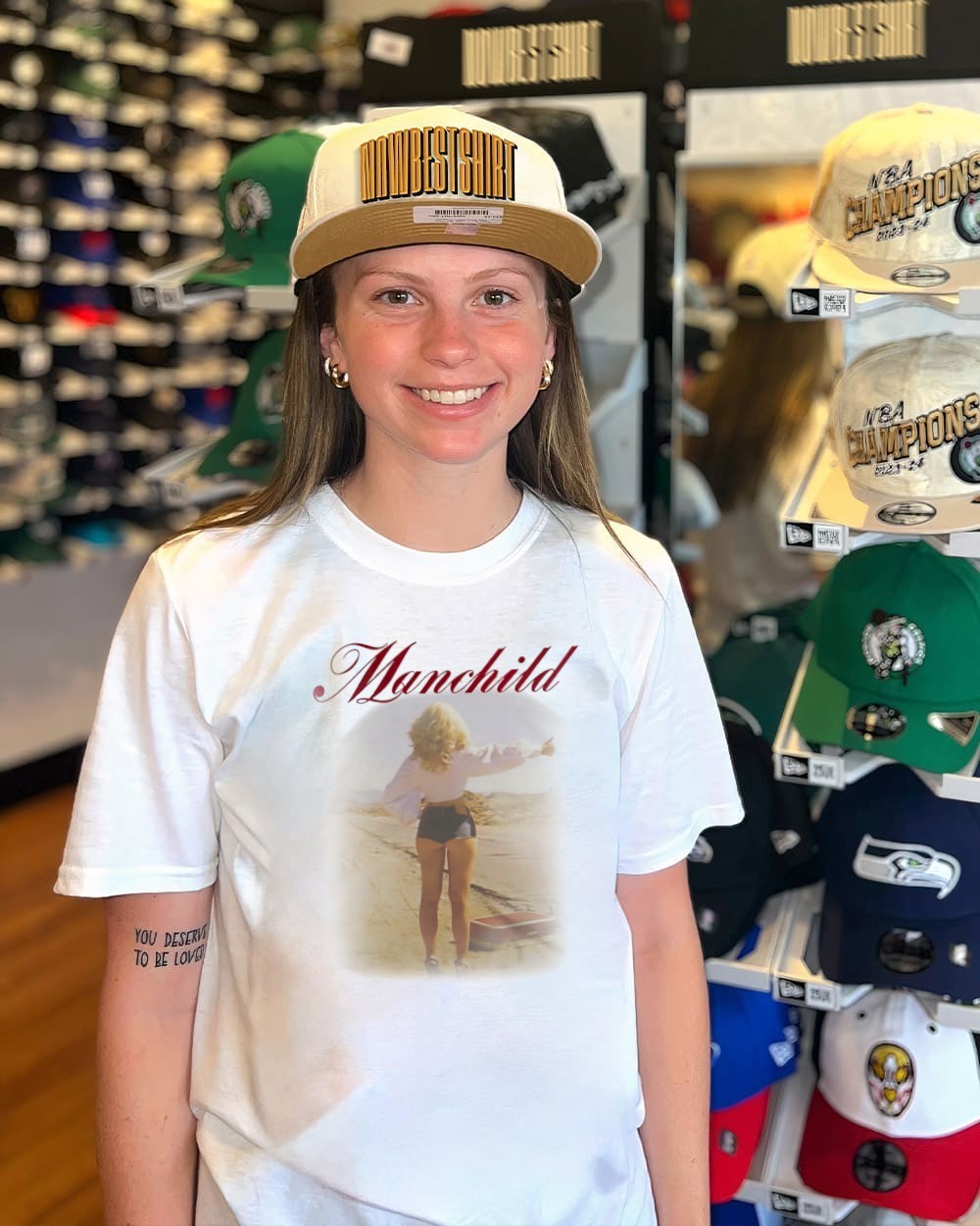 Momo and Jihyo wearing Sabrina Carpenter Manchild shirt, hoodie